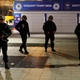 Police stand outside the Stade de France.